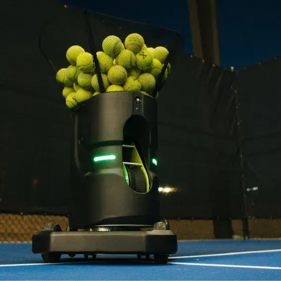 Tennibot Partner V2 ball machine moving on a tennis court